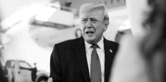 Trump Warns Iran of “Deal or Destruction” as He Rejects War Powers Limits Amid Rising Tensions Donald Trump speaking at the White House addressing Iran tensions and military options