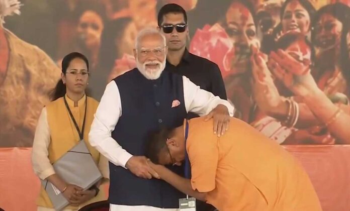 west-bengal-cm-oath-2026-su Suvendu Adhikari seeking blessings from Prime Minister Narendra Modi.