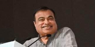 Union Minister Nitin Gadkari speaking at an event promoting 100% ethanol fuel vehicles in India.