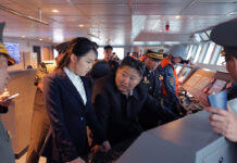 Kim Jong Un Inspects New Destroyer Warship, Vows Faster Naval Nuclear Expansion North Korean leader Kim Jong Un inspecting the Kang Kon destroyer during sea trials as military officials accompany him.