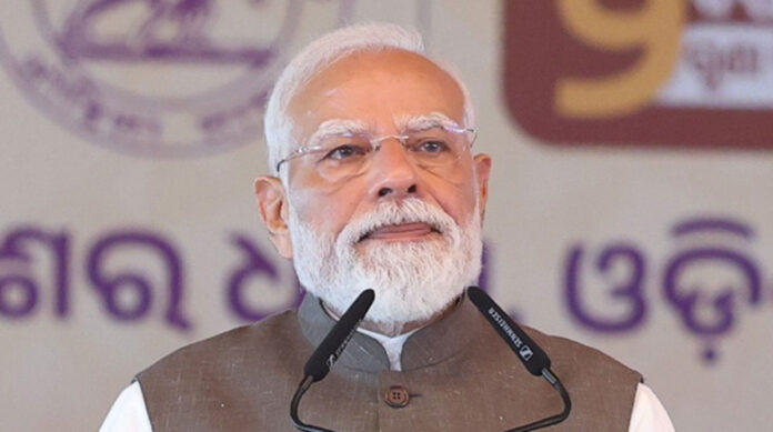 pm-modi-odisha-development- Prime Minister Narendra Modi addresses a public gathering in Rairangpur after unveiling development projects worth over ₹47,600 crore in Odisha.