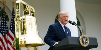 President Donald Trump says lawmakers are considering expanding the proposed Russia sanctions legislation to include Iran and Hezbollah.