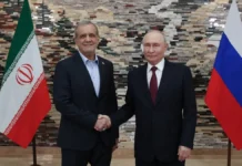 Putin Signals Support for Iran, Offers Help to Ease Tehran-Washington Tensions President of the Islamic Republic of Iran Masoud Pezeshkian with President of the Russian Federation Vladimir Putin