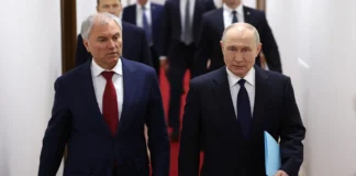 Vladimir Putin with a restrained Baltic military backdrop for the Kaliningrad nuclear warning