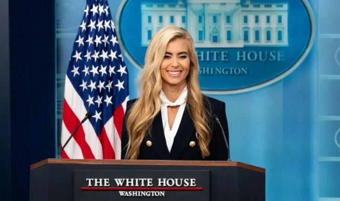 White House press secretary Katie Zacharia speaks at the podium during her first briefing under President Donald Trump.